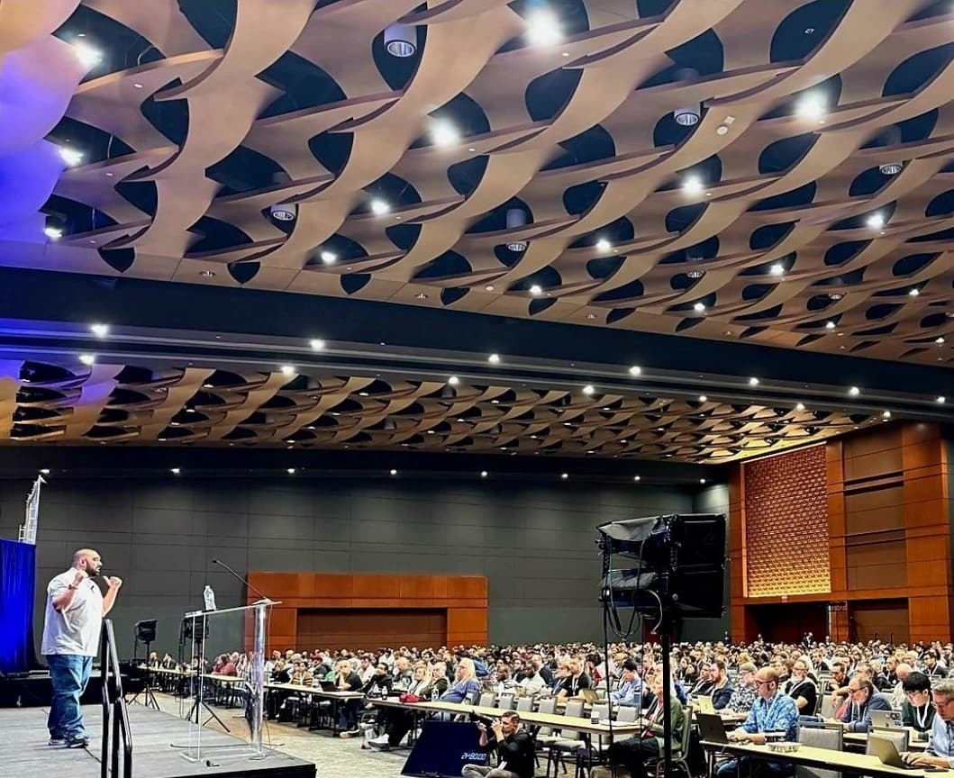 Speaker presenting at a tech event